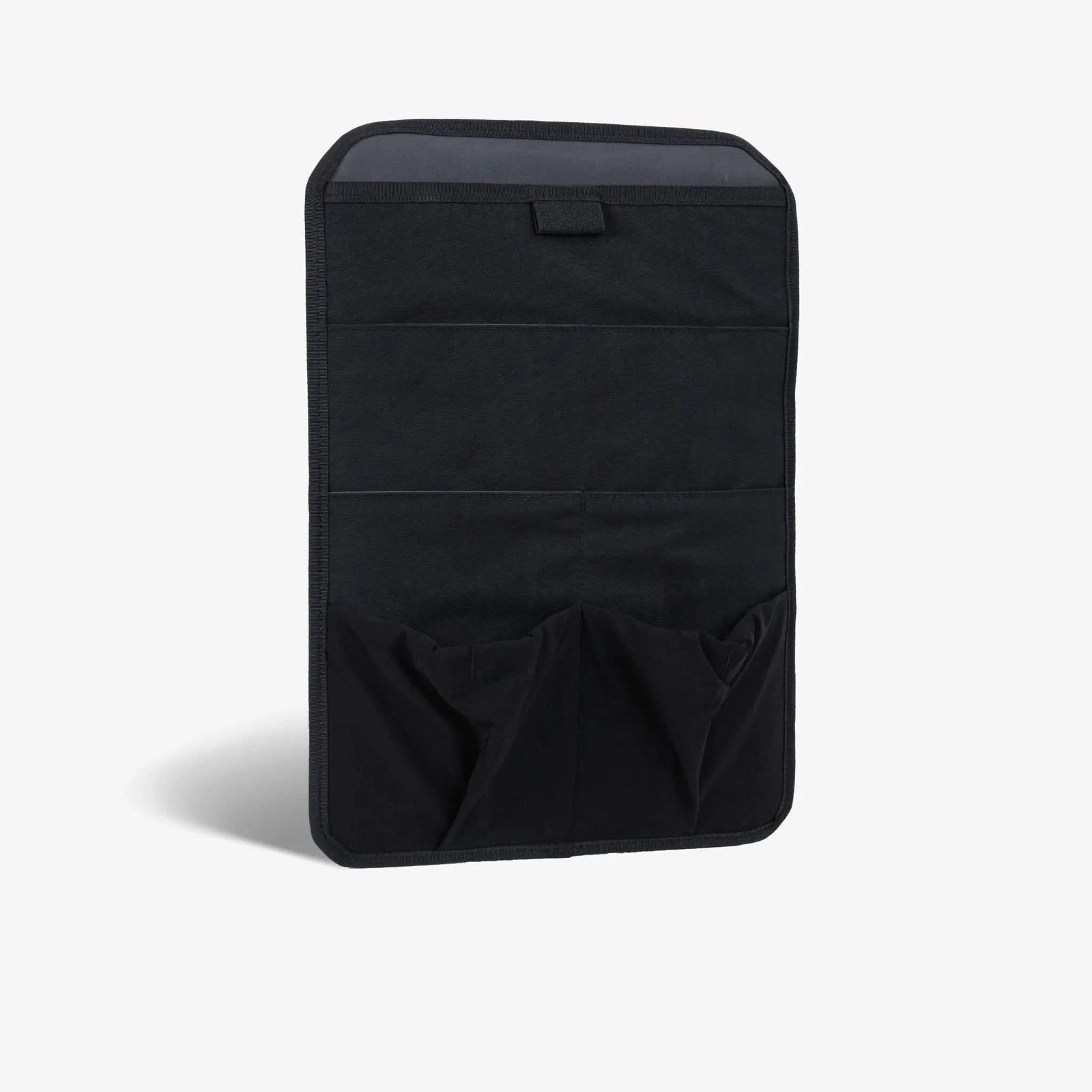 Nectrum laptop sleeve interior — stretch-mesh organizer pockets for cables, charger, and accessories