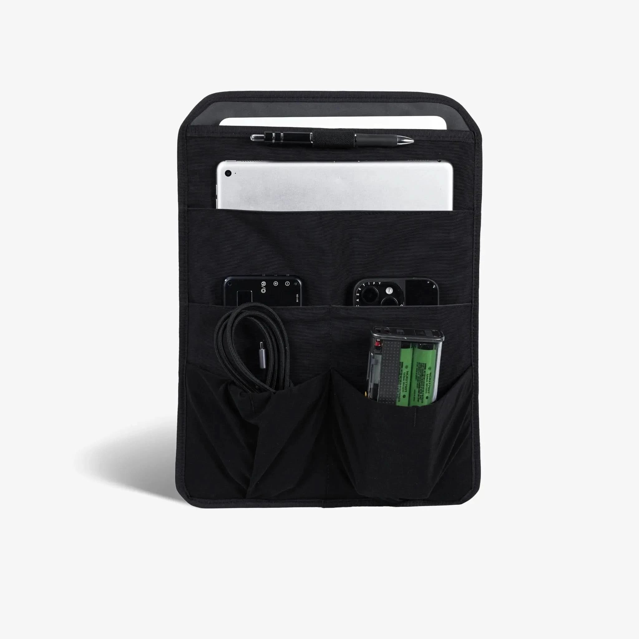 Nectrum laptop sleeve holding MacBook Pro and iPad Air, showing padded storage compartments
