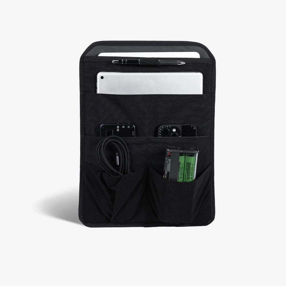 Laptop sleeve fitting MacBook Pro and iPad Air — padded storage compartments for commuter backpack