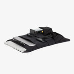 Nectrum laptop sleeve laid flat — scratch-resistant rubberized base, anti-slip texture, recycled fabric