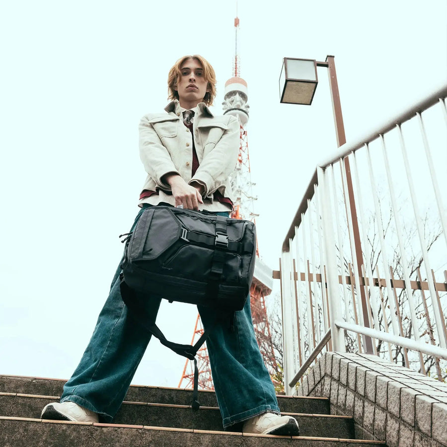 Vanta 22 EPX travel backpack — roller-bag pass-through strap for airport use