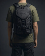 Nectrum Vanta 22 EPX on model — commuter backpack lifestyle, urban professional